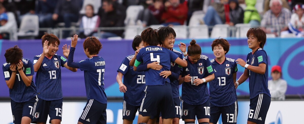 Joy for Japan after scoring against Spain.